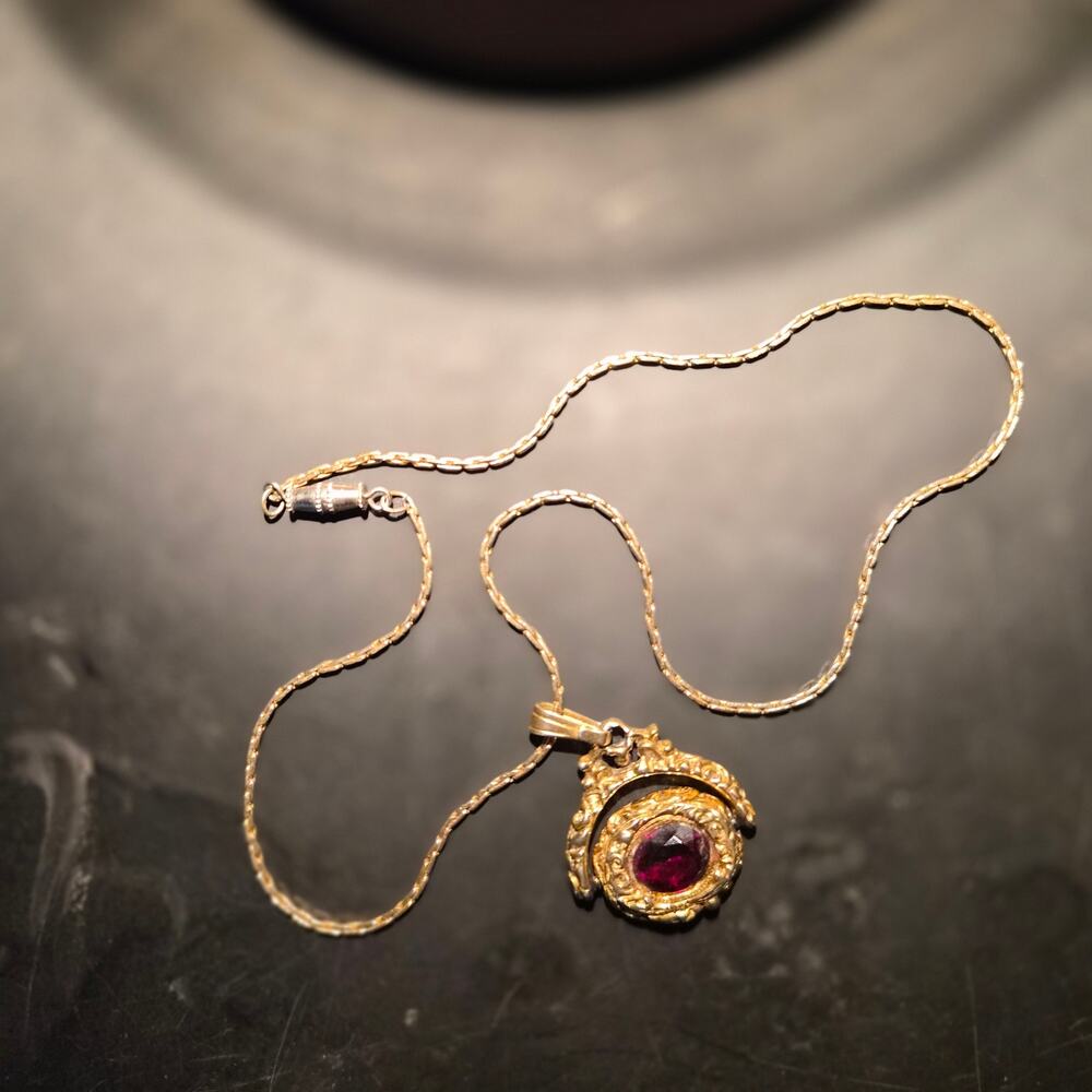 Gold flip necklace